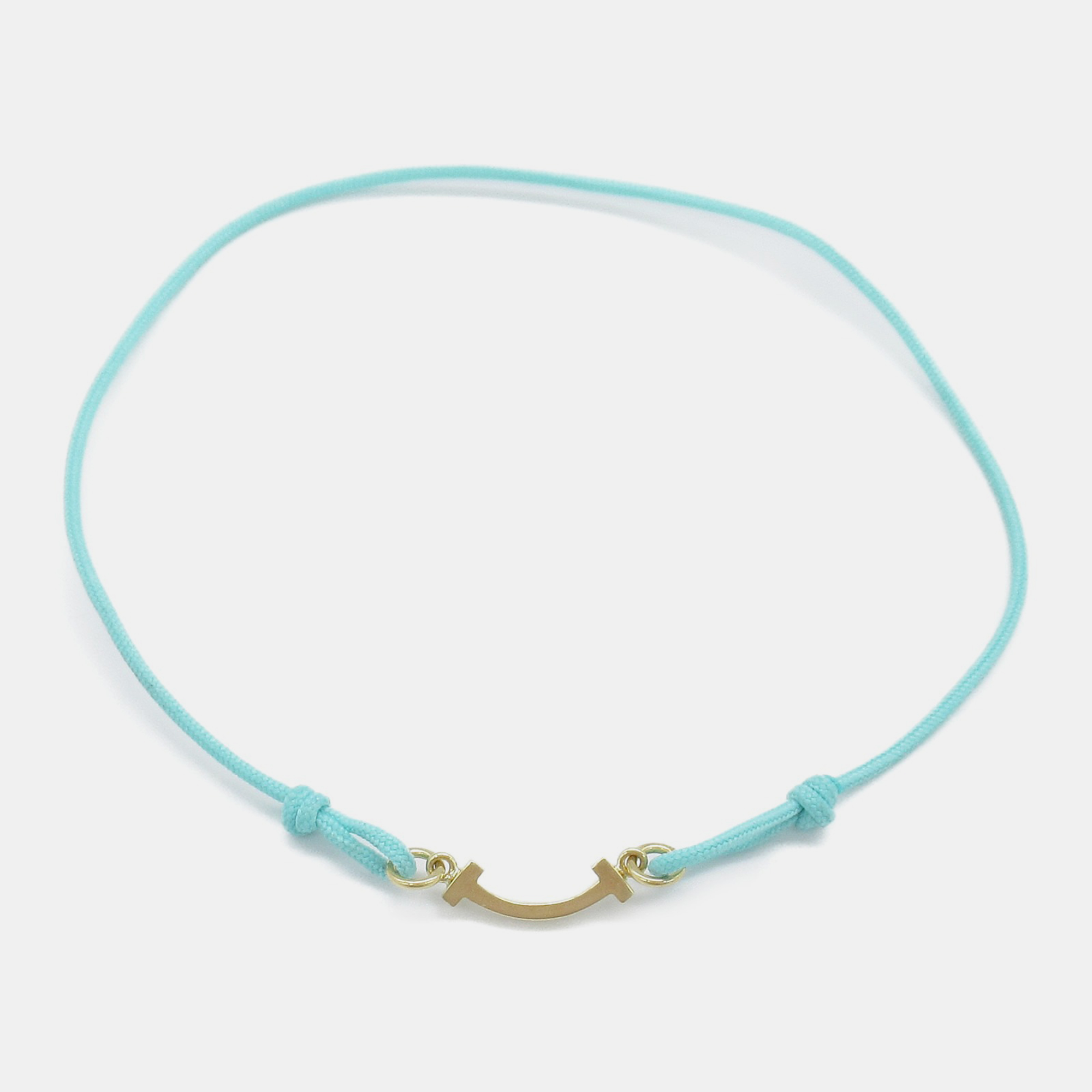 

Tiffany & Co. 18K Yellow Gold T Smile Cord Bracelet