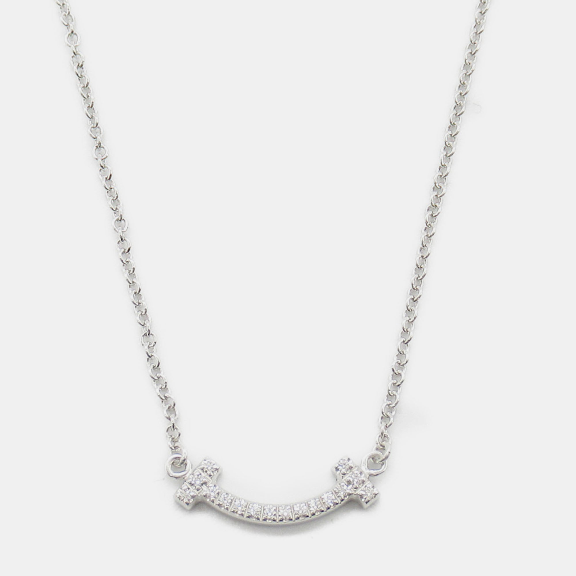 

Tiffany & Co. 18K White Gold Diamond T Smile Micro Necklace