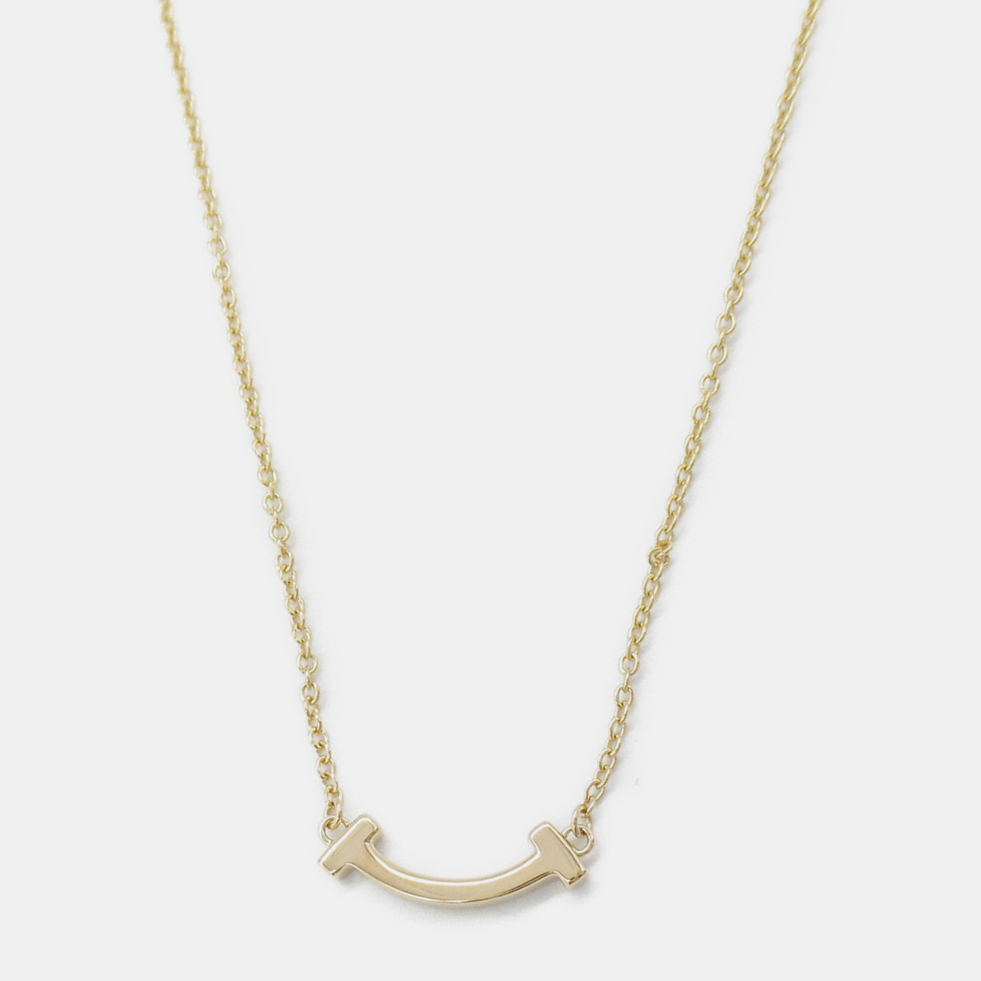 

Tiffany & Co. 18K Yellow Gold T Smile Mini Necklace