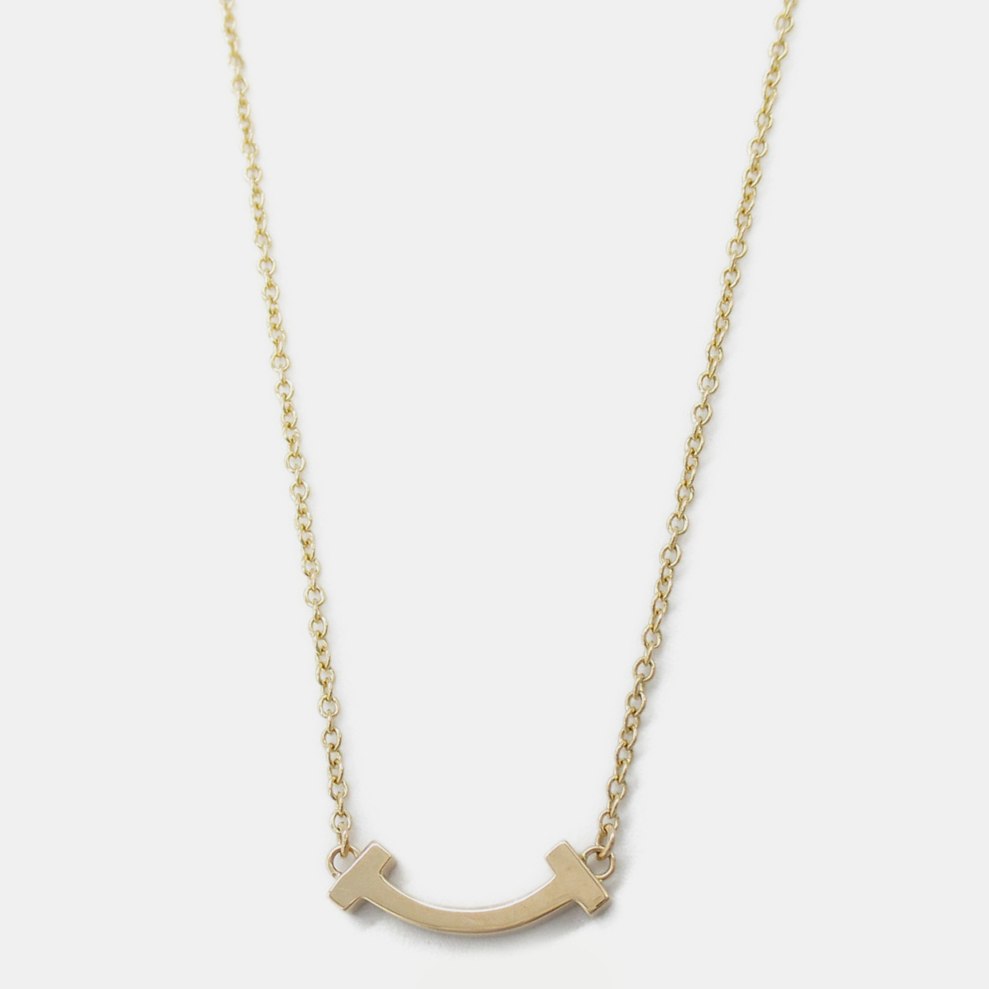 

Tiffany & Co. 18K Yellow Gold T Smile Mini Necklace