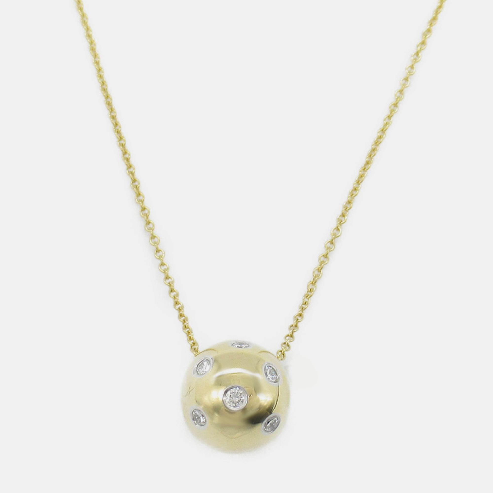 

Tiffany & Co. 18k Yellow Gold Platinum Etoile Diamond Ball Pendant Necklace