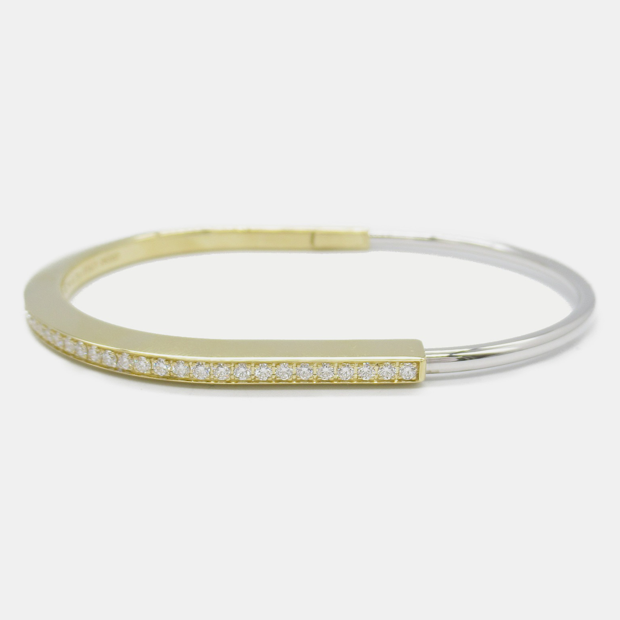 

Tiffany & Co. 18K Yellow Gold Diamond Lock Bangle Bracelet