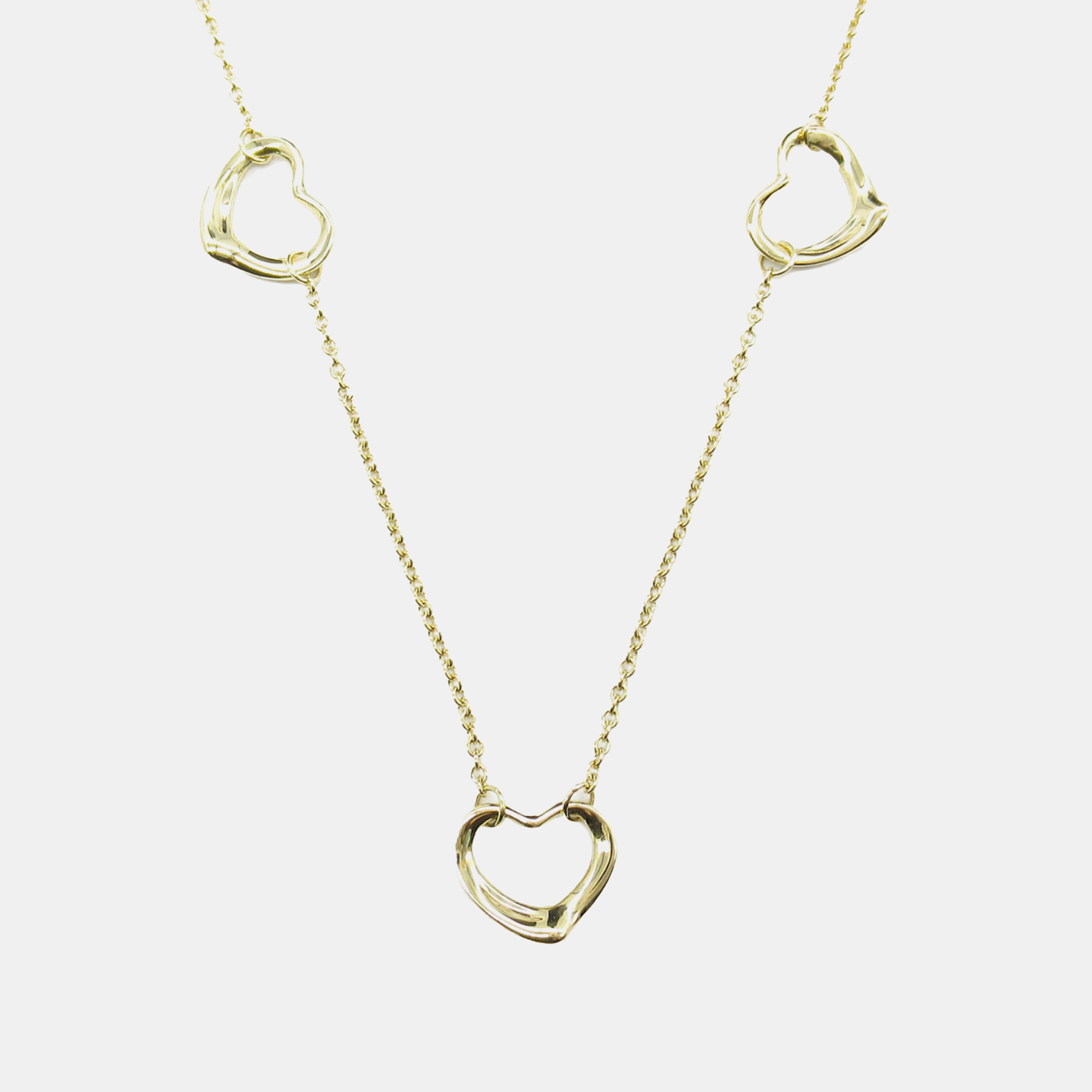 

Tiffany & Co. 18K Yellow Gold Elsa Peretti Open Heart 3 Motifs Necklace