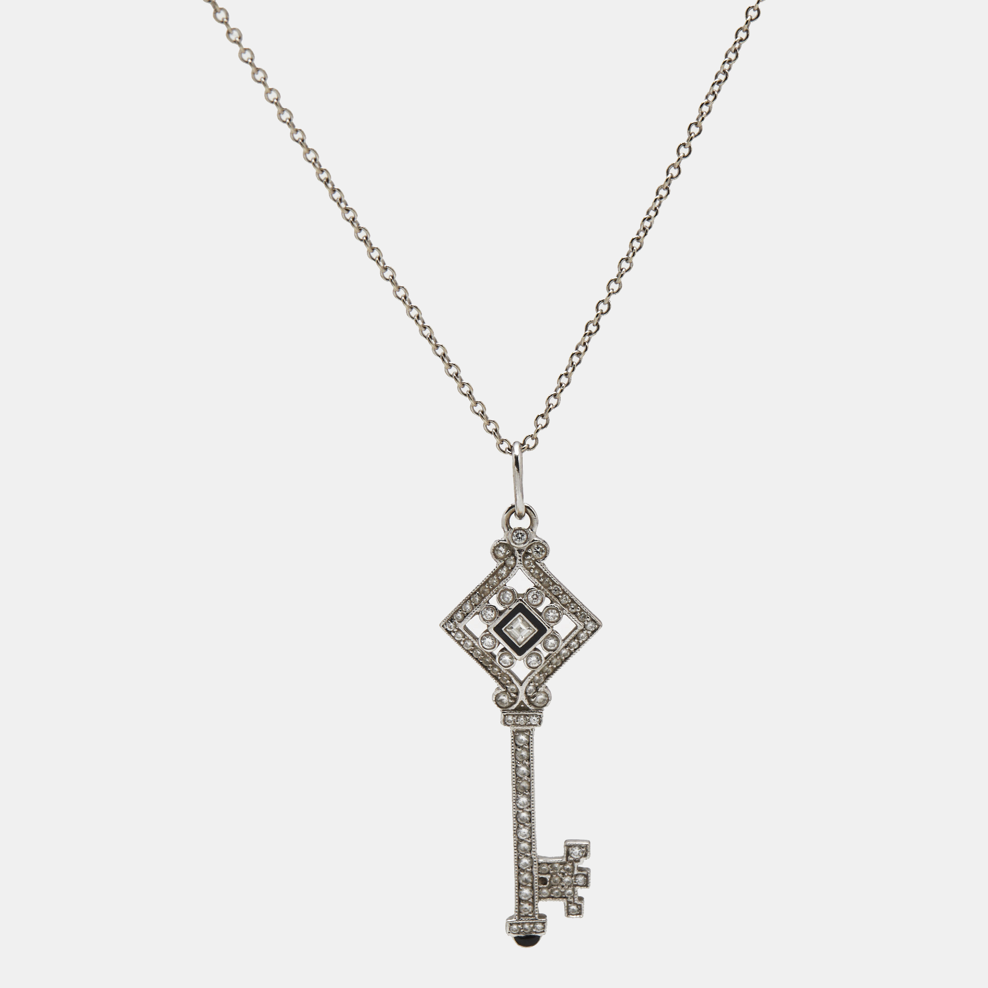 

Tiffany & Co. Diamond Black Enamel 18k White Gold Key Pendant Necklace