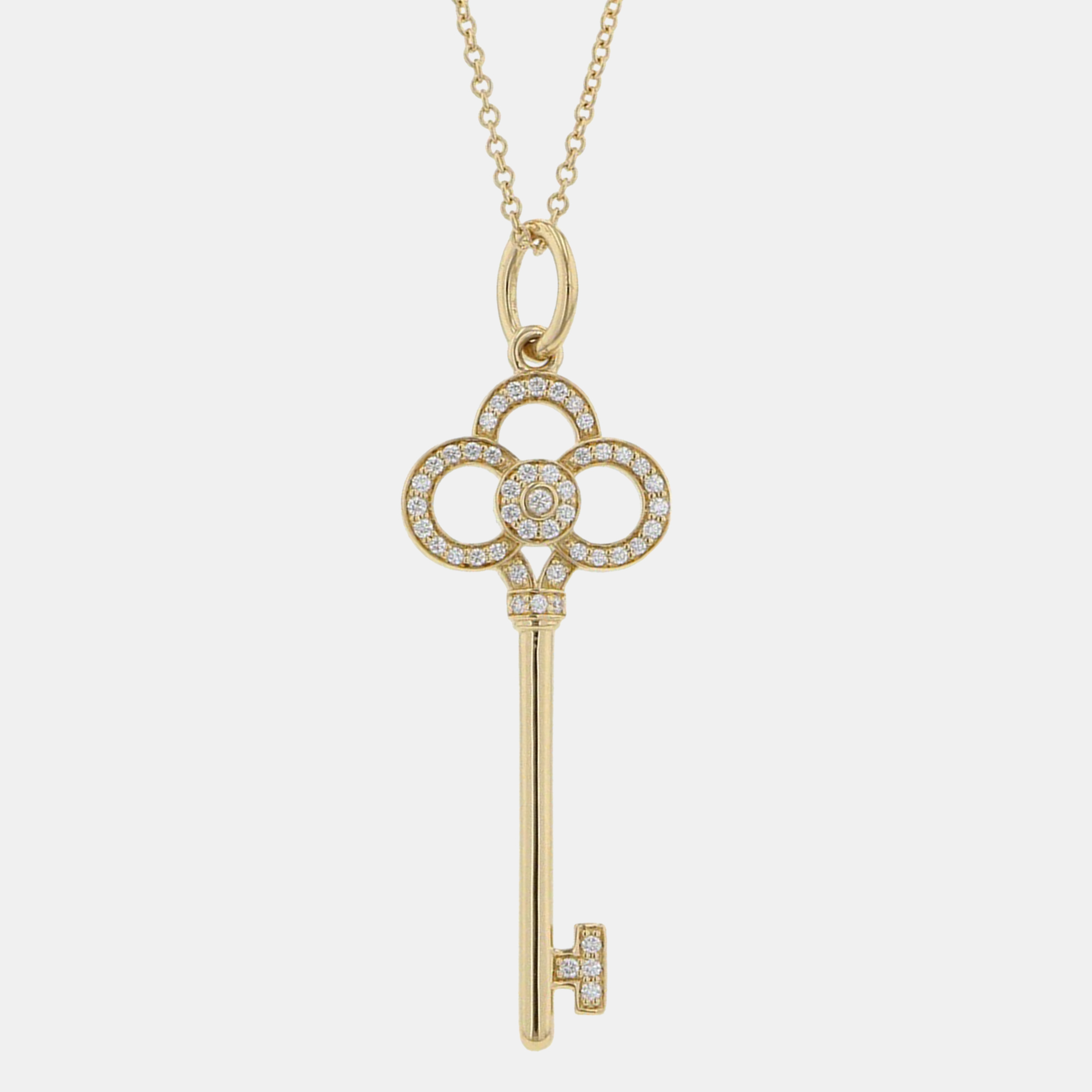 

Tiffany & Co. Crown Key Diamond 18K Yellow Gold Pendant Necklace