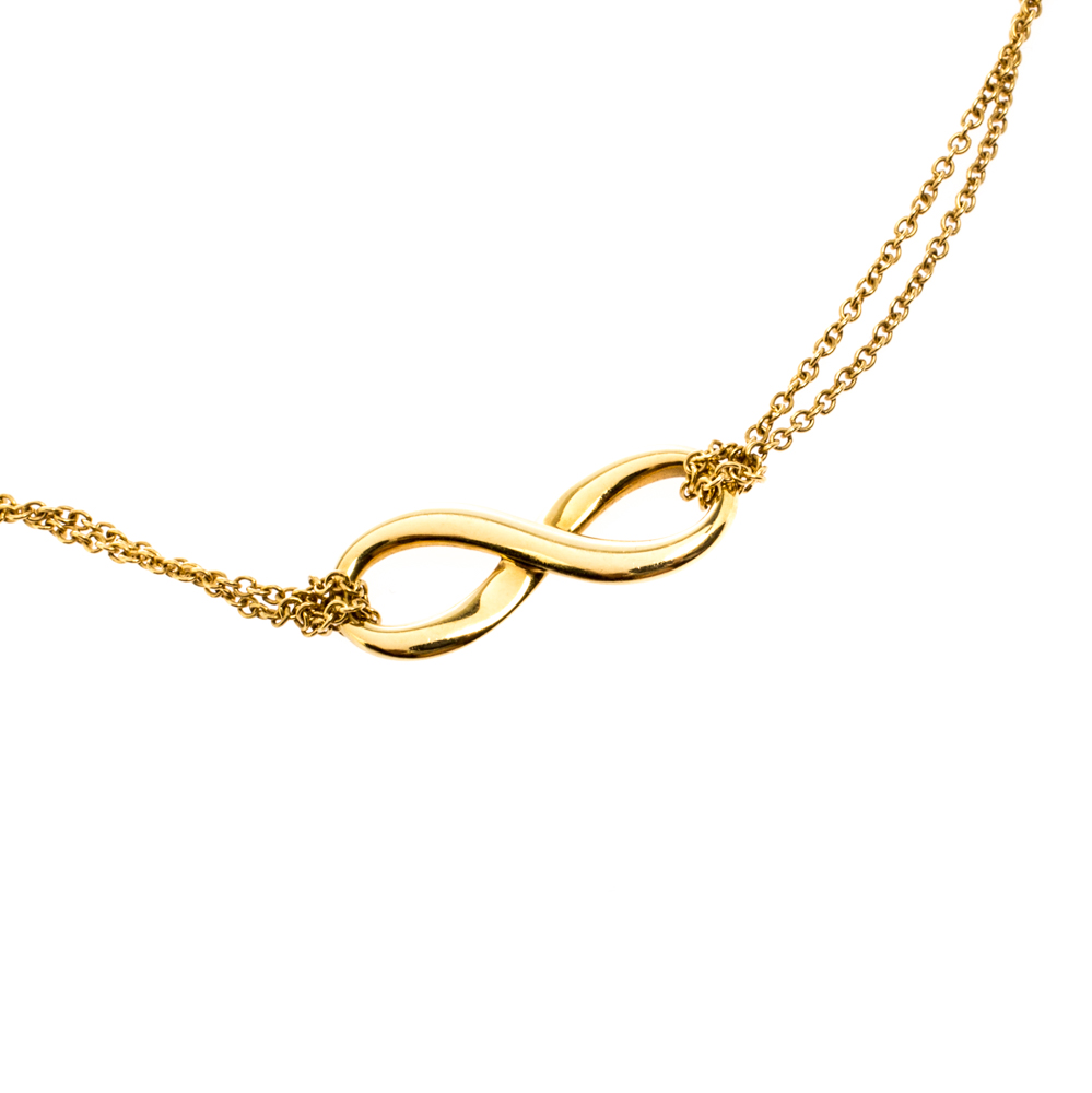 e85fd234f403c Tiffany & Co. Infinity 18k Yellow Gold Double Chain Pendant Necklace