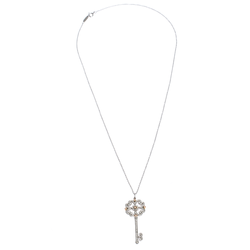 

Tiffany & Co. Tiffany Enchant Diamond Platinum & 18K Gold Quatra Heart Key Pendant Necklace
