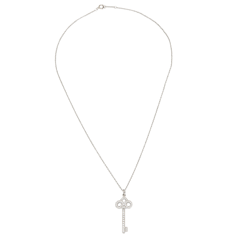 

Tiffany & Co. Fleur De Lis 0.12 ctw Diamond Key Platinum Pendant Necklace, Silver