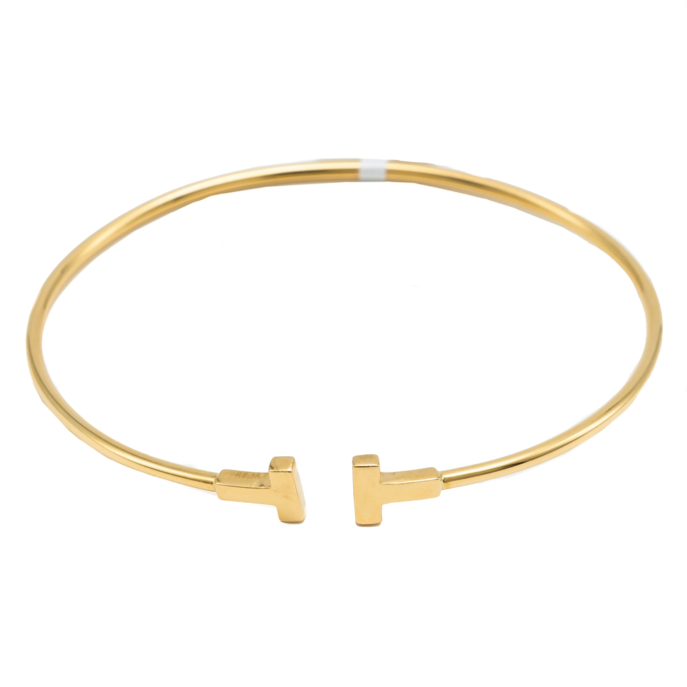 

Tiffany & Co. T Yellow Gold Narrow Wire Bracelet