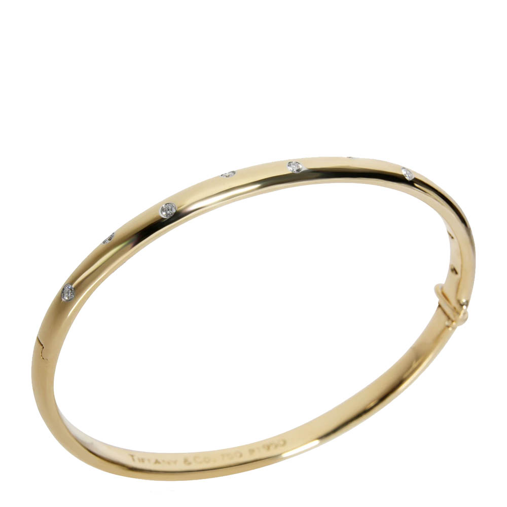 

Tiffany & Co. 18K Yellow Gold and 950 Platinum 0.33 CTW Diamond Etoile Bangle