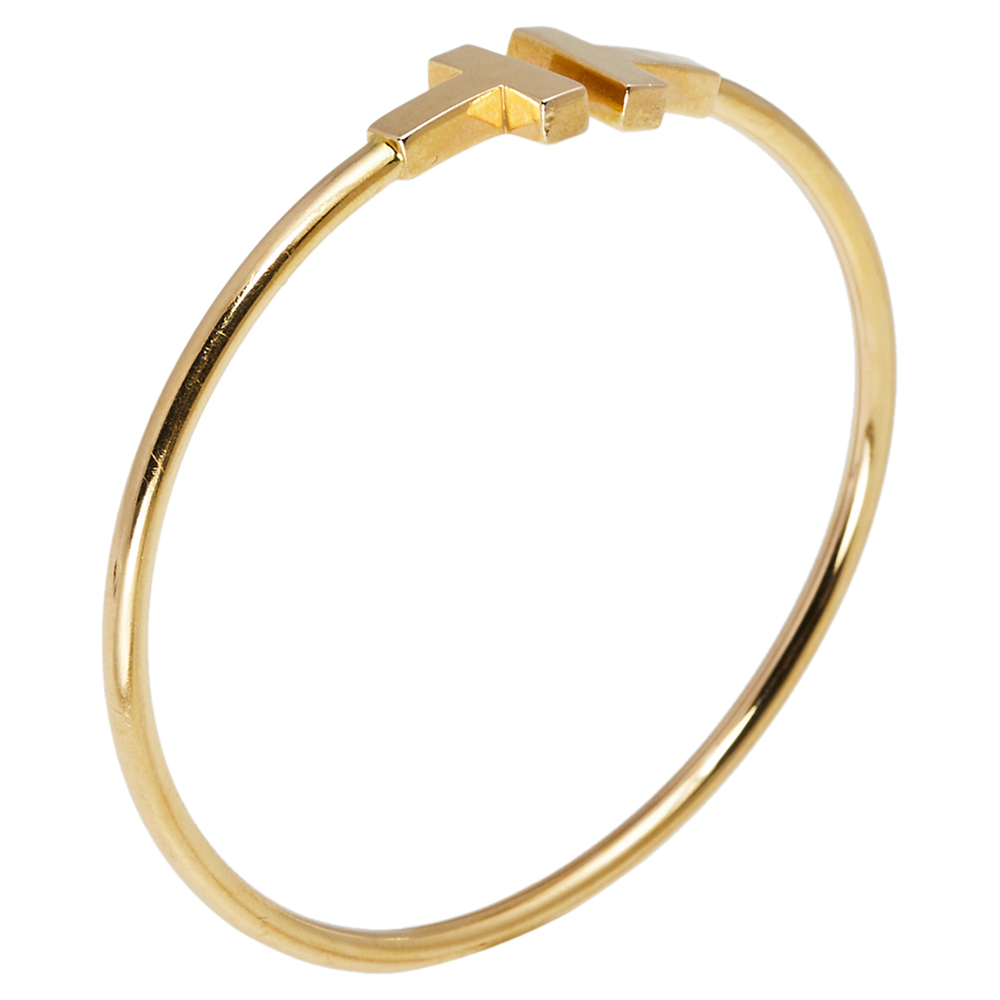 

Tiffany & Co. T Wire Narrow 18K Yellow Gold Open Cuff Bracelet