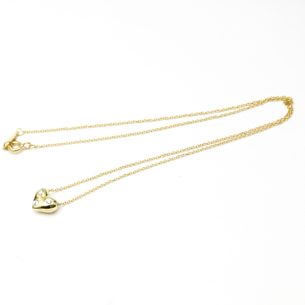 

Tiffany & Co. Etoile Heart 18K Yellow Gold Platinum Diamond Necklace