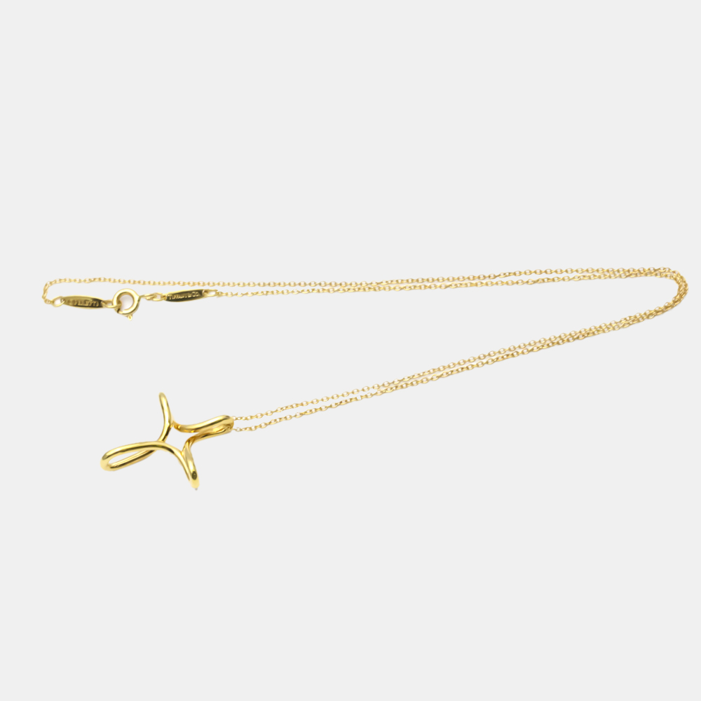 

Tiffany & Co. Infinity Cross 18K Yellow Gold Necklace