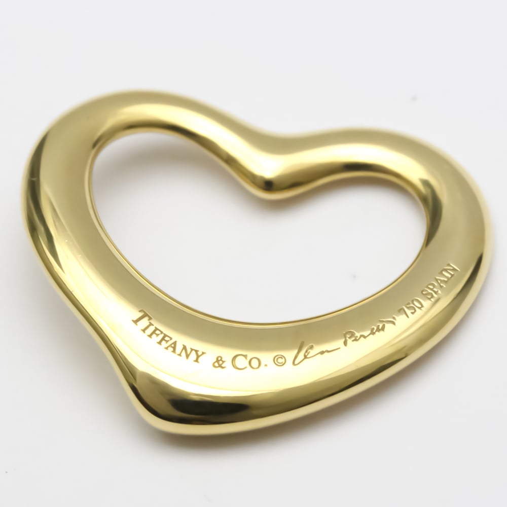 

Tiffany & Co. Elsa Peretti Open Heart 18K Yellow Gold Charms and Pendant