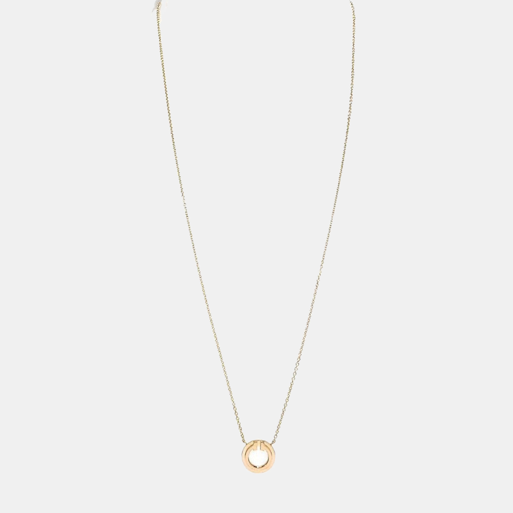 

Tiffany & Co. Yellow Gold and Mother-of-Pearl Tiffany T Circle Pendant Necklace