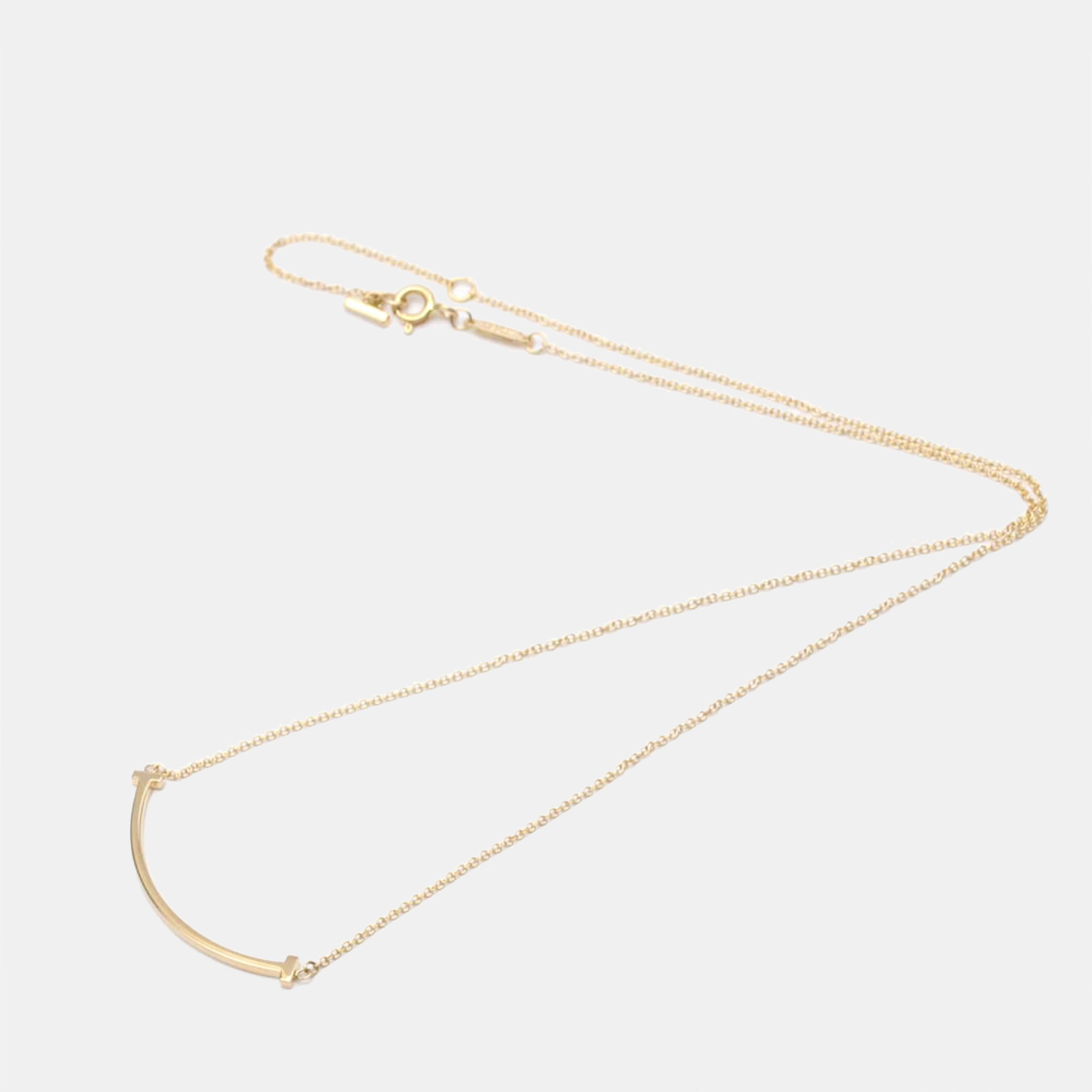 

Tiffany & Co. 18K Rose Gold Small T Smile Pendant Necklace
