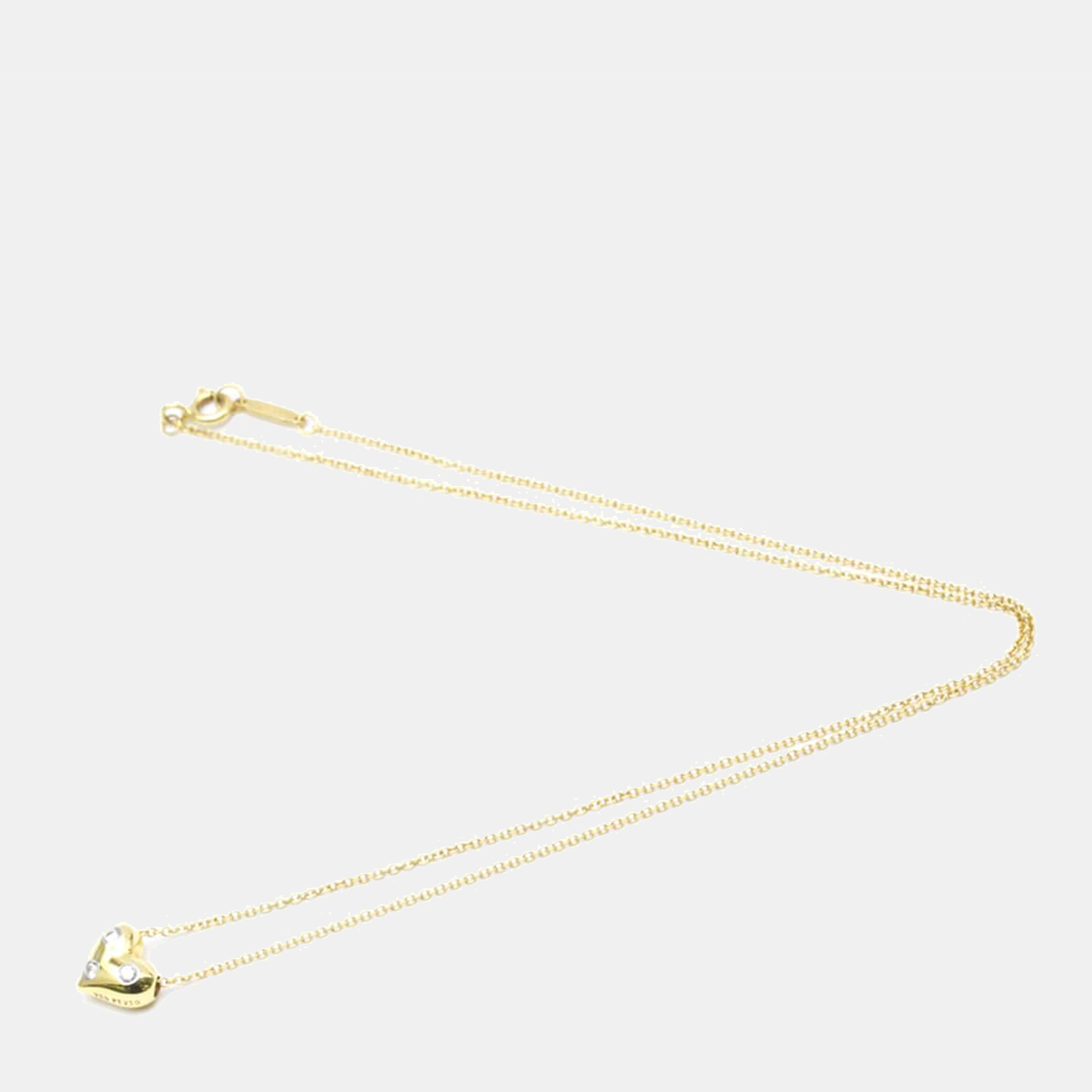 

Tiffany & Co. Etoile 18K Yellow Gold Platinum Diamond Necklace