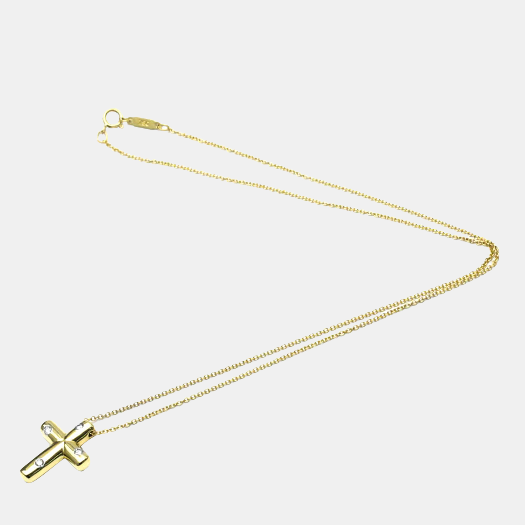 

Tiffany & Co. Etoile Dots Cross 18K Yellow Gold Diamond Necklace