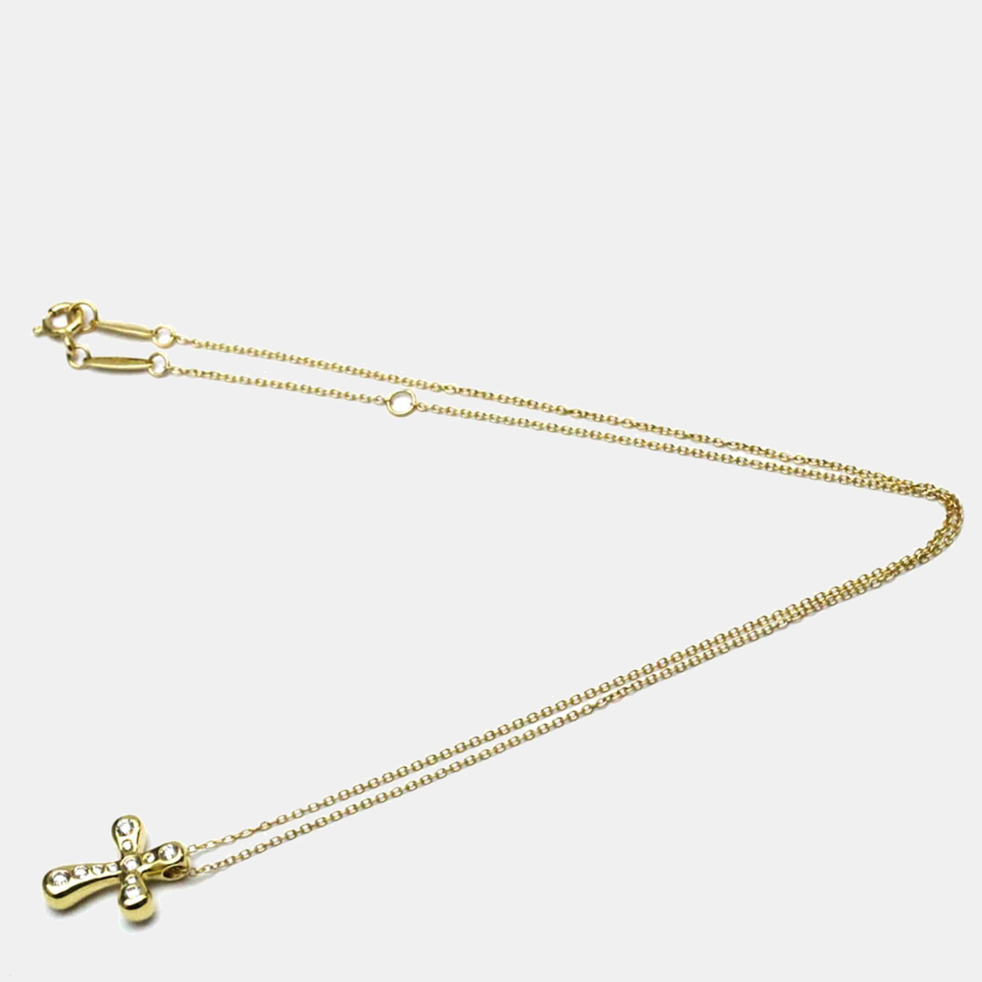 

Tiffany & Co. Etoile Cross 18K Yellow Gold Diamond Necklace