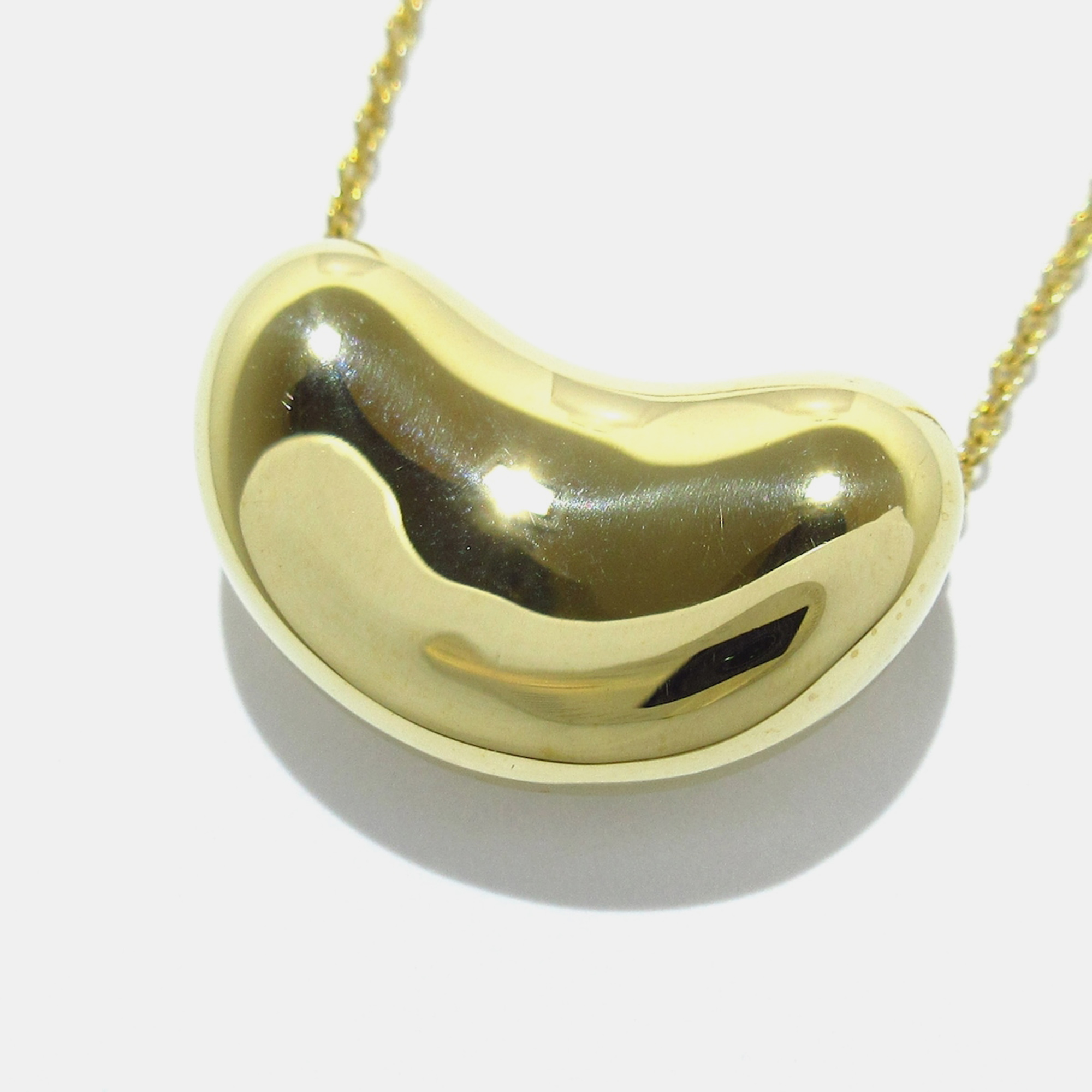 

Tiffany & Co. 18K Yellow Gold Bean Pendant Necklace