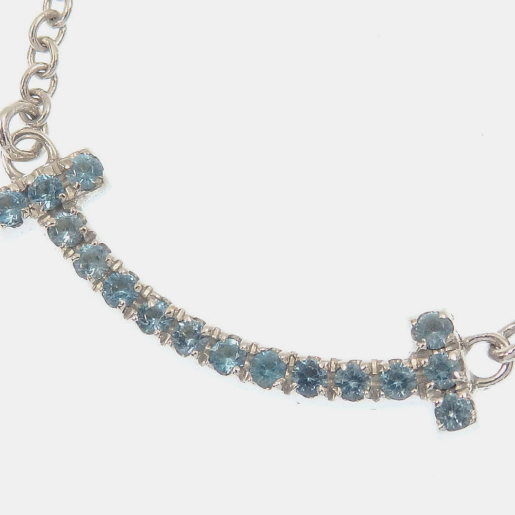 

Tiffany & Co. 18K White Gold with Blue Topaz Mini T Smile Pendant Necklace
