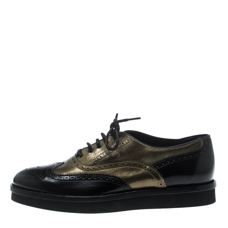 

Tod's Metallic Gold And Black Brogue Leather Lace-Up Oxfords Size