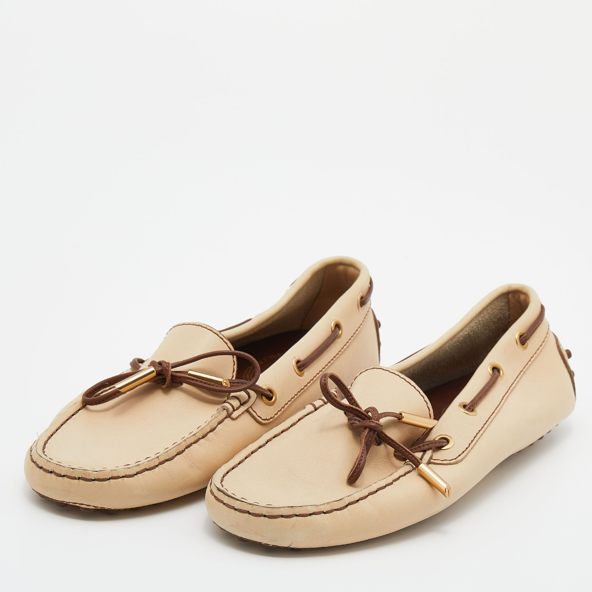 

Tod's Beige Leather Gommino Bow Slip On Loafers Size