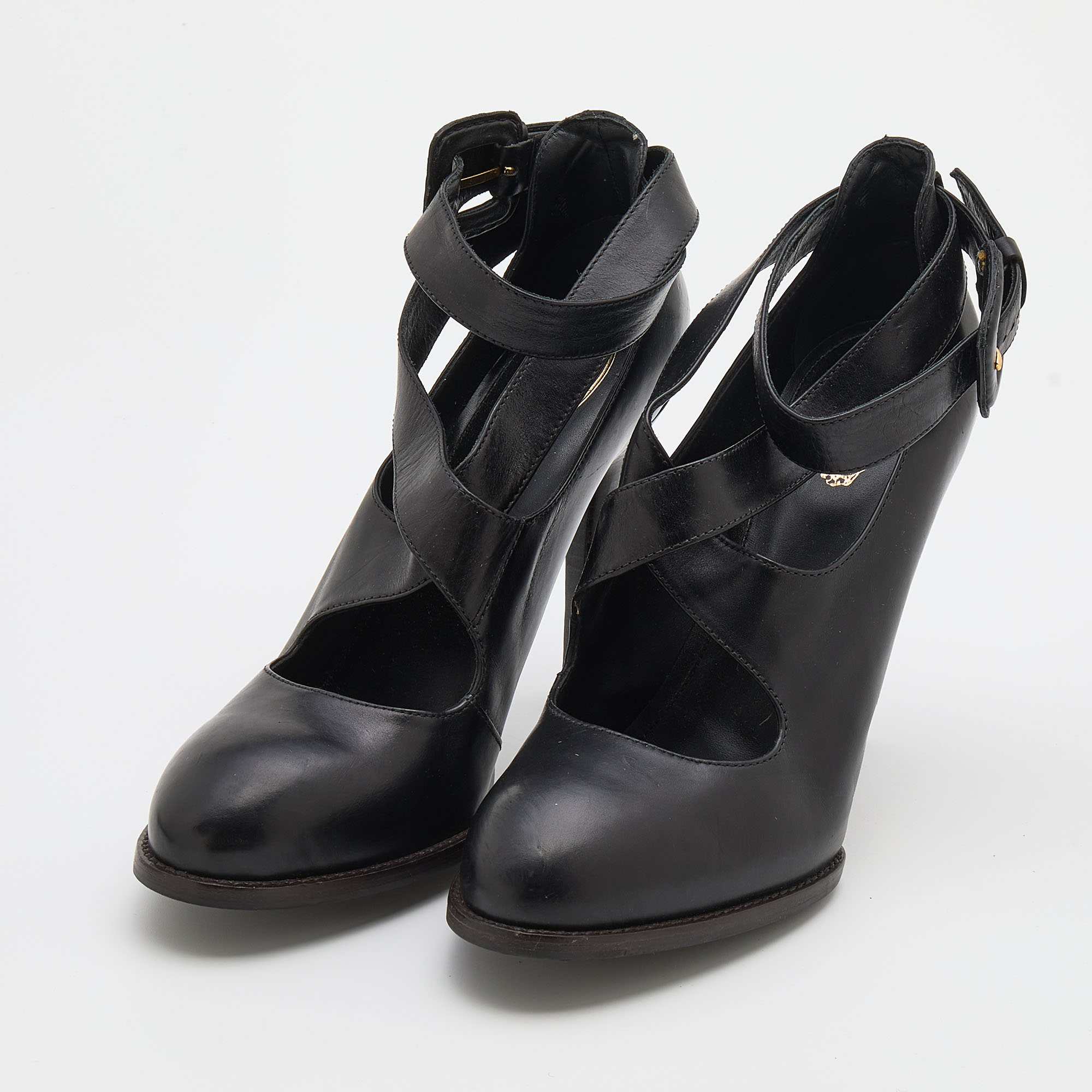 

Tod's Black Leather Cross Strap Pumps Size