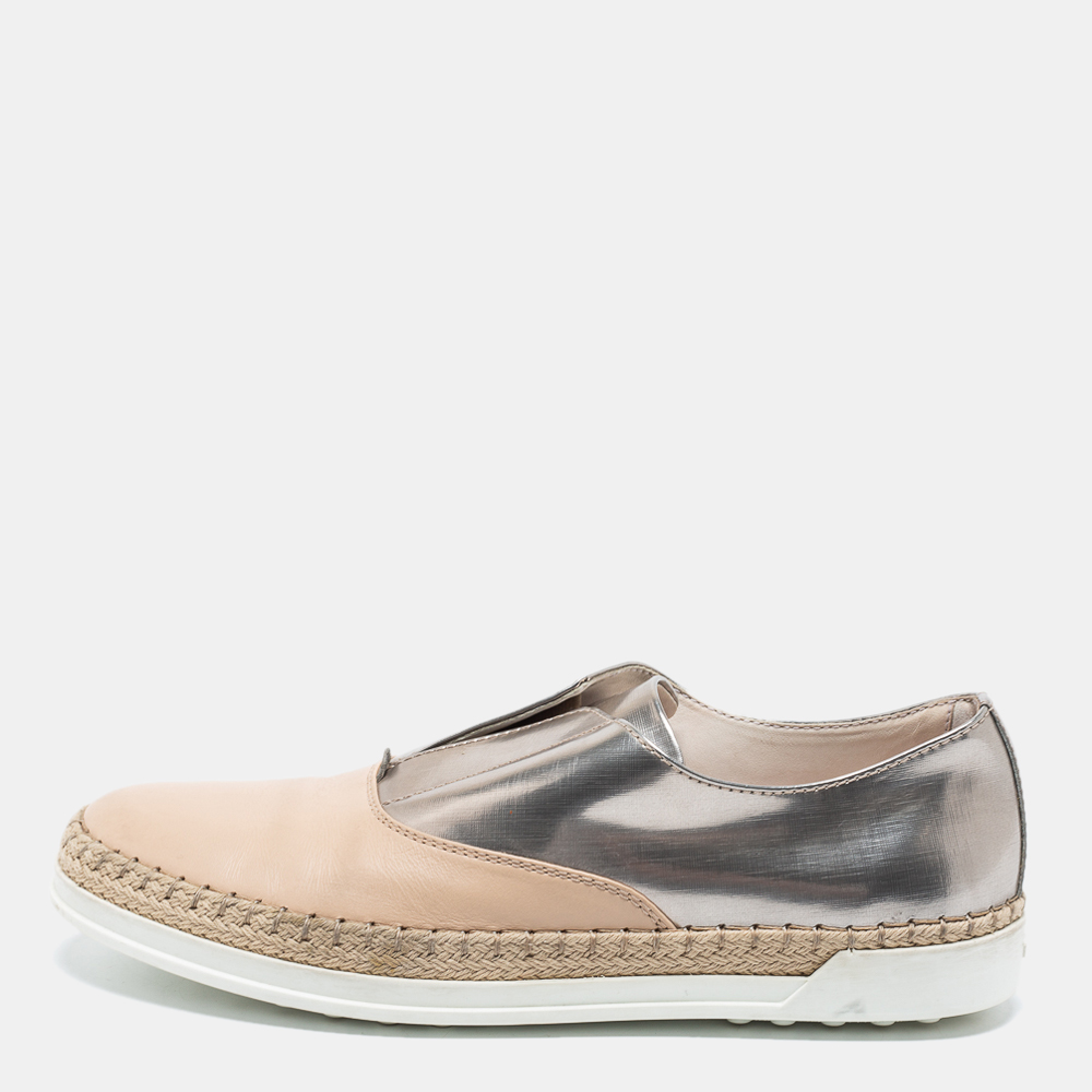 These unique espadrille sneakers from Tods get full marks for style and comfort The low top sneakers have been crafted from patent as well as leather. They come equipped with comfortable insoles and pebbled rubber soles.