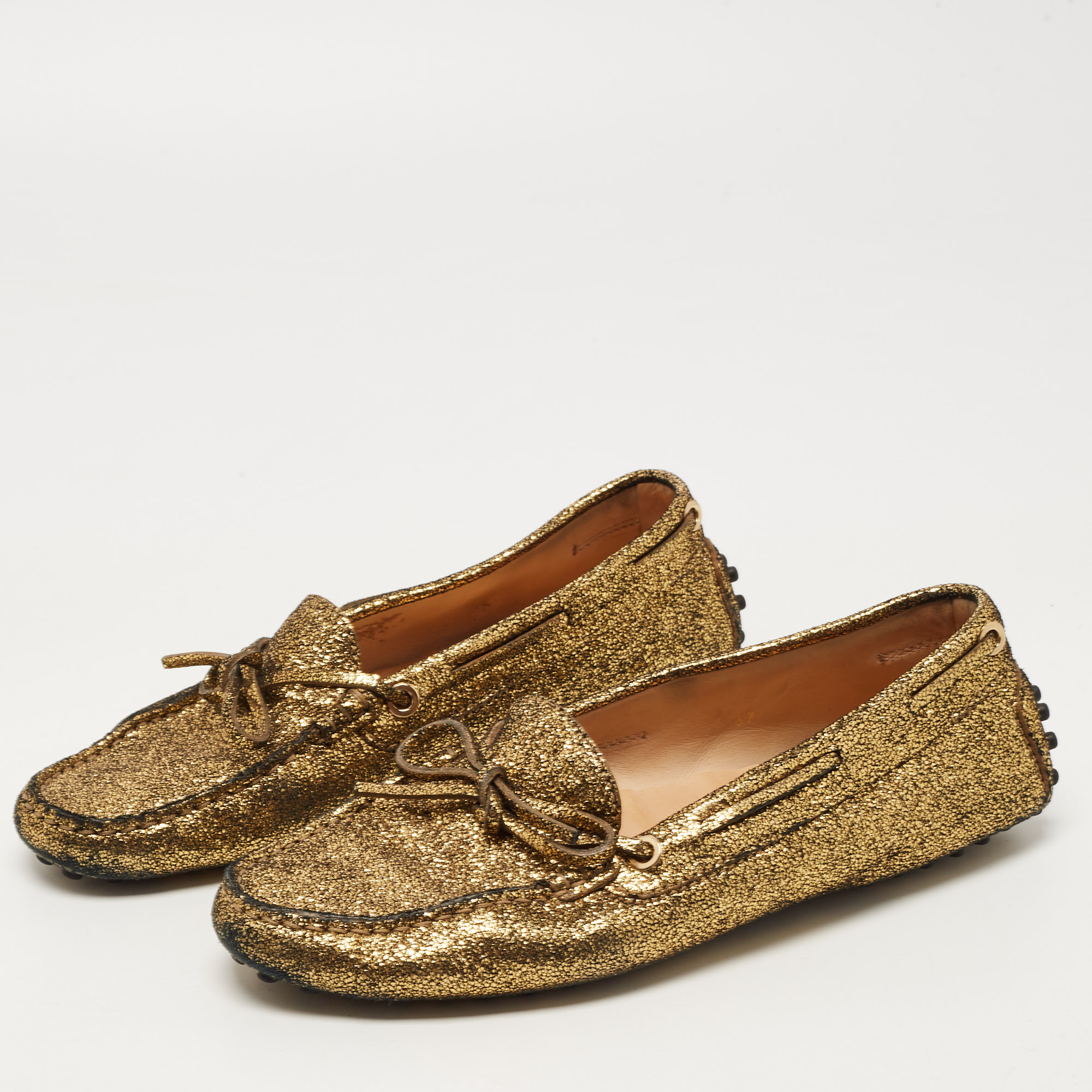 

Tod's Metallic Gold Foil Leather Gommino Bow Slip On Loafers Size