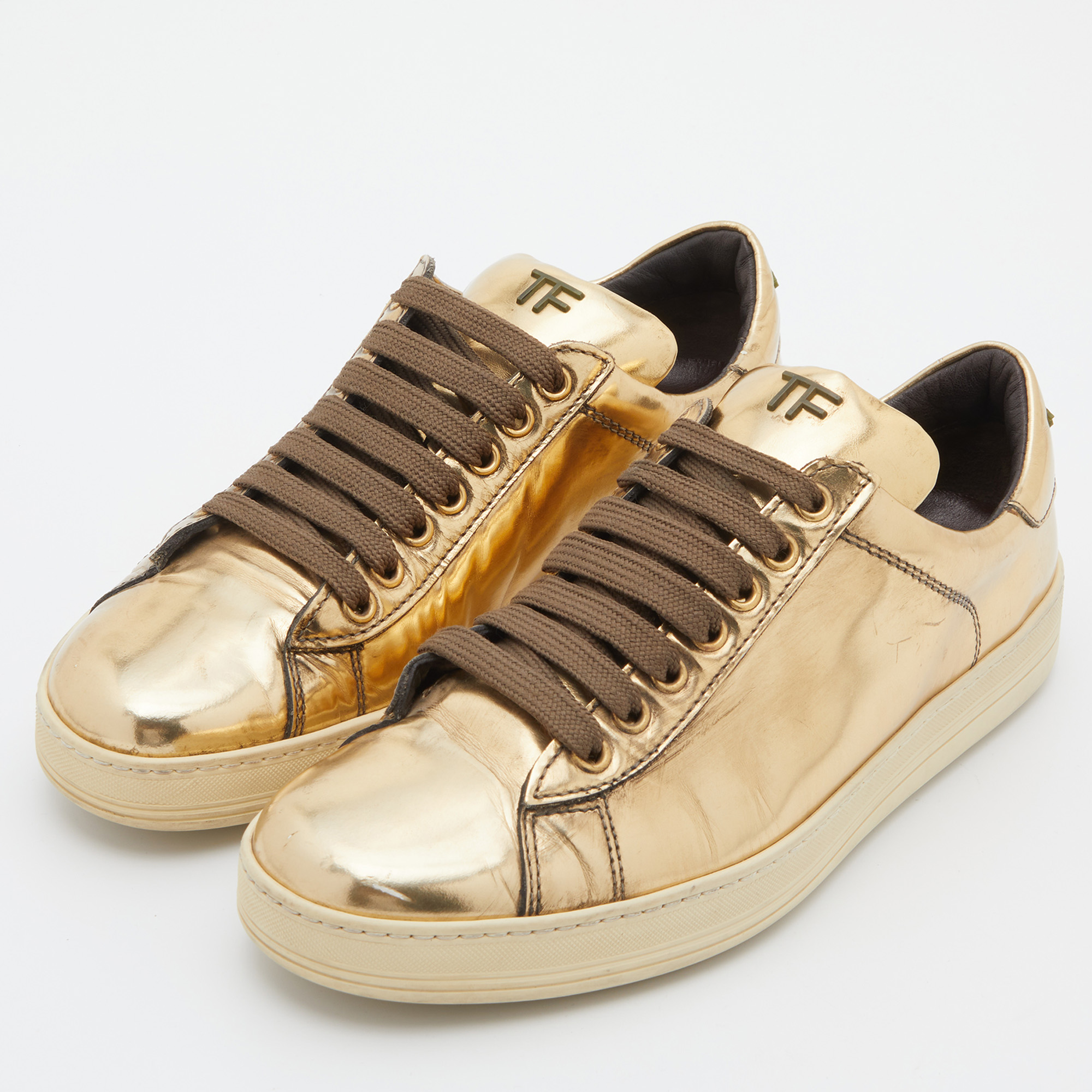 

Tom Ford Metallic Gold Patent Leather Low Top Sneakers Size