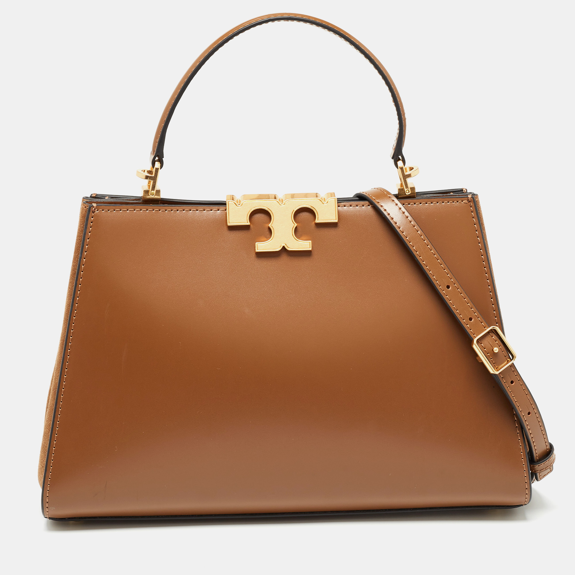 Indulge in luxury with this Tory Burch bag. Meticulously crafted from premium materials it combines exquisite design impeccable craftsmanship and timeless elegance. Elevate your style with this fashion accessory.