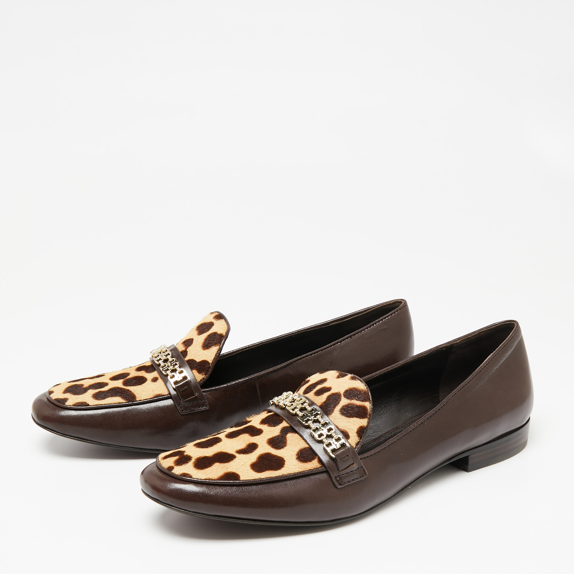 

Tory Burch Dark Brown Leather Leopard Print Calf hair Gemini Link Slip On Loafers Size