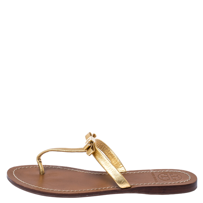 

Tory Burch Gold Leather Bow Thong Sandals Size