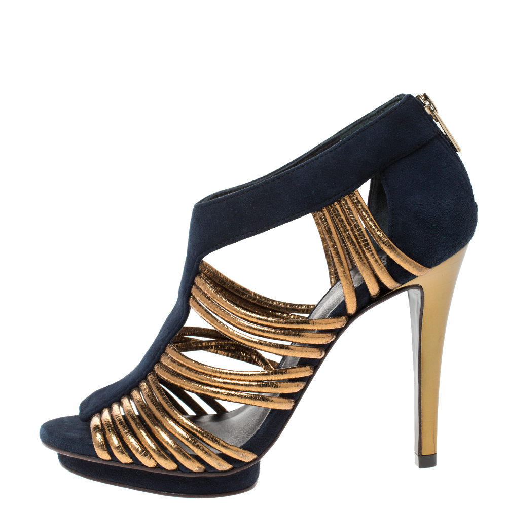 

Tory Burch Navy Blue Suede and Gold Leather Strappy Sandals Size