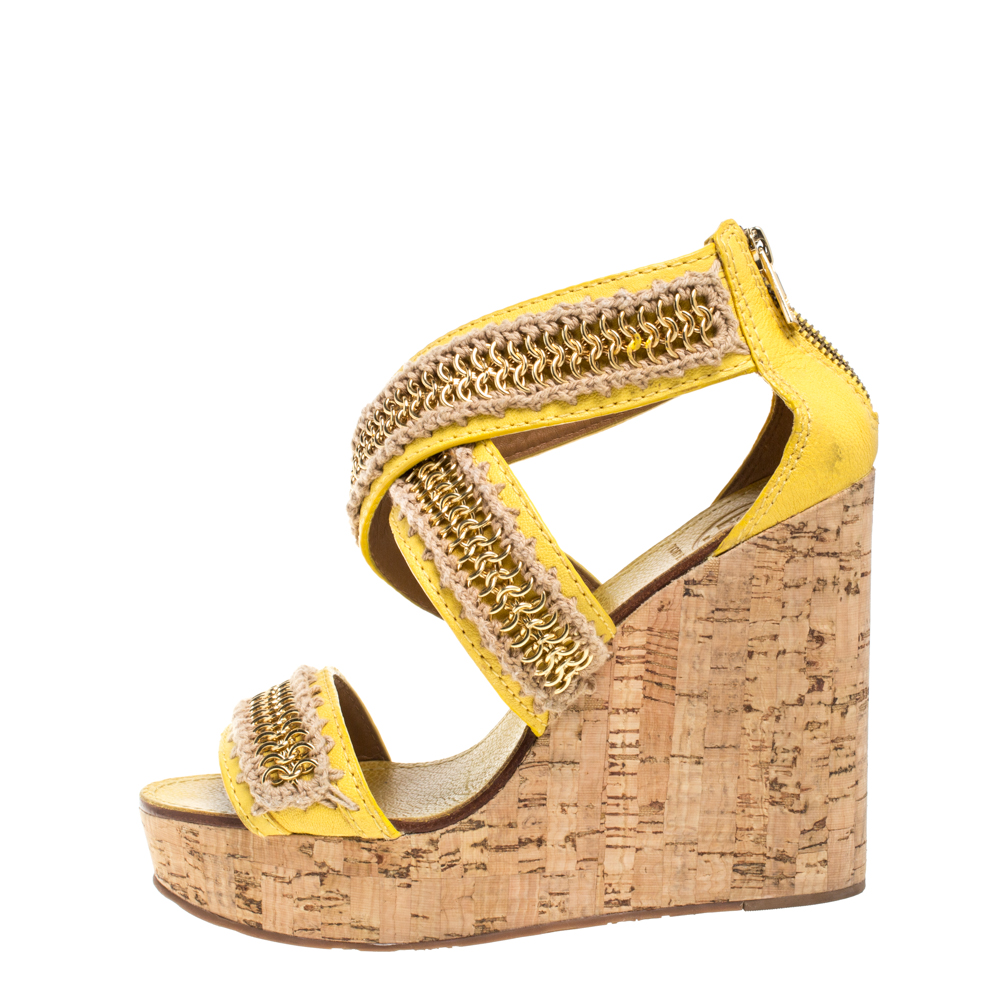 

Tory Burch Yellow Leather Lucian Chain Embellished Cork Wedge Sandals Size