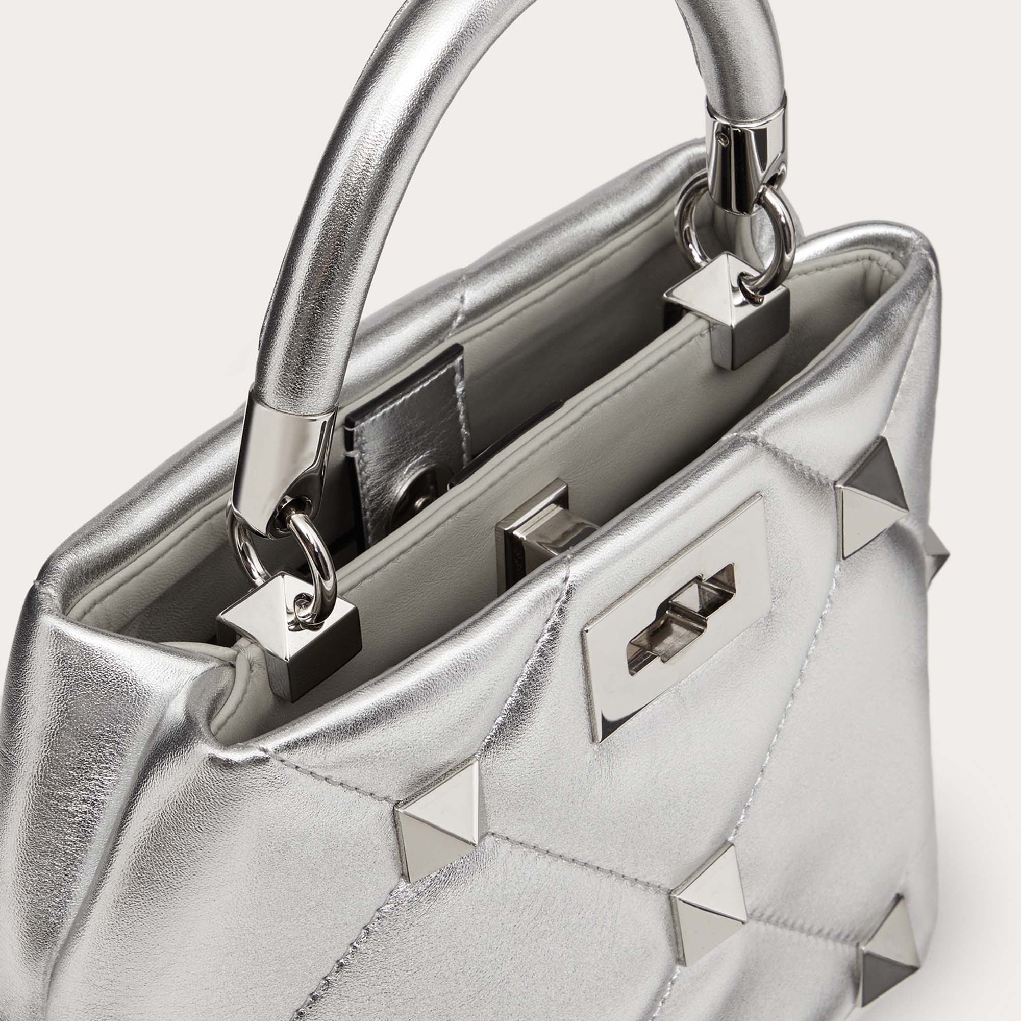 

Valentino Silver Quilted Leather Roman Stud Top Handle Bag