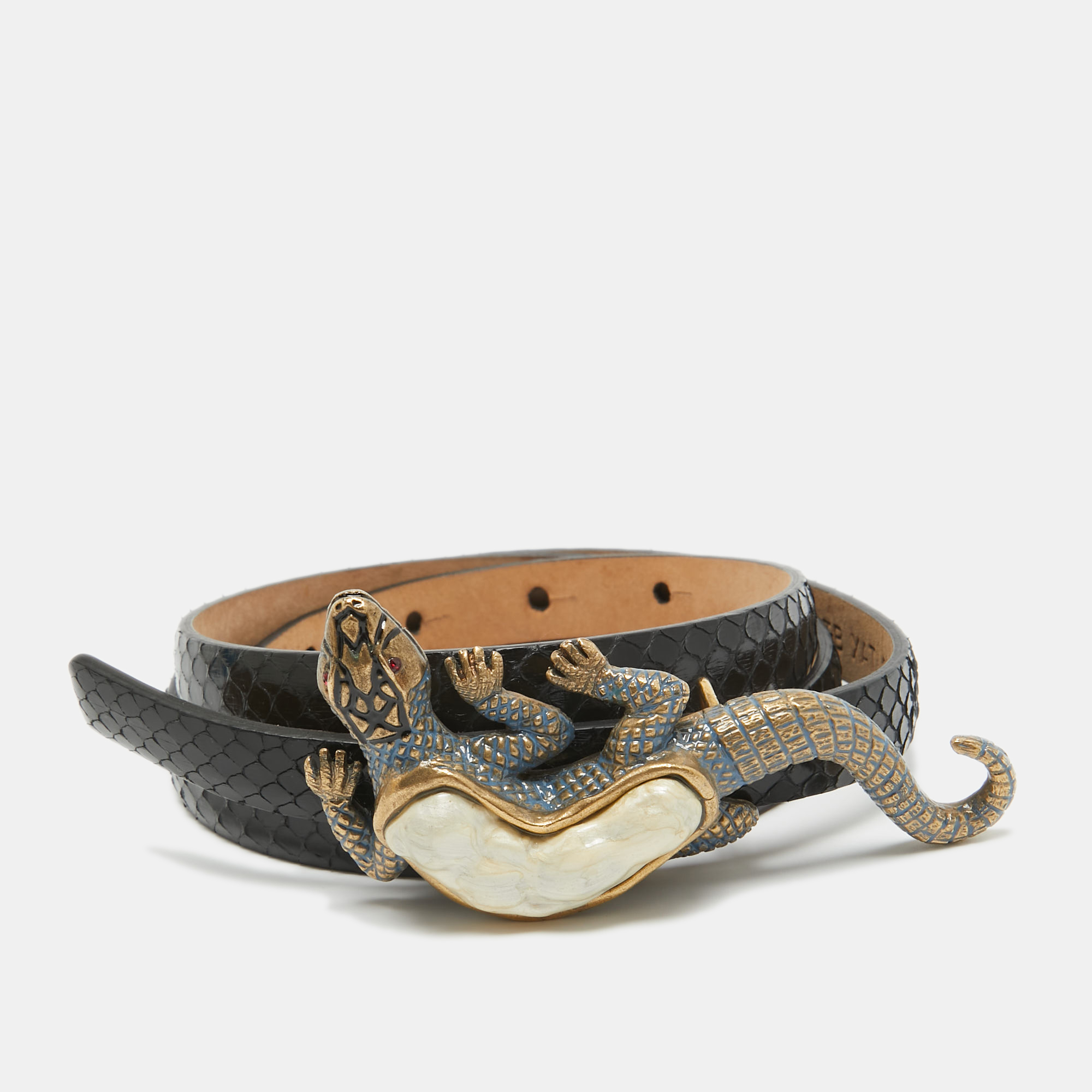 Accessorize like a fashionista using this Lizard Buckle Belt by Valentino. The piece is crafted from watersnake leather in a classy black hue and completed with a gold tone snake buckle that stands out owing to its high design.