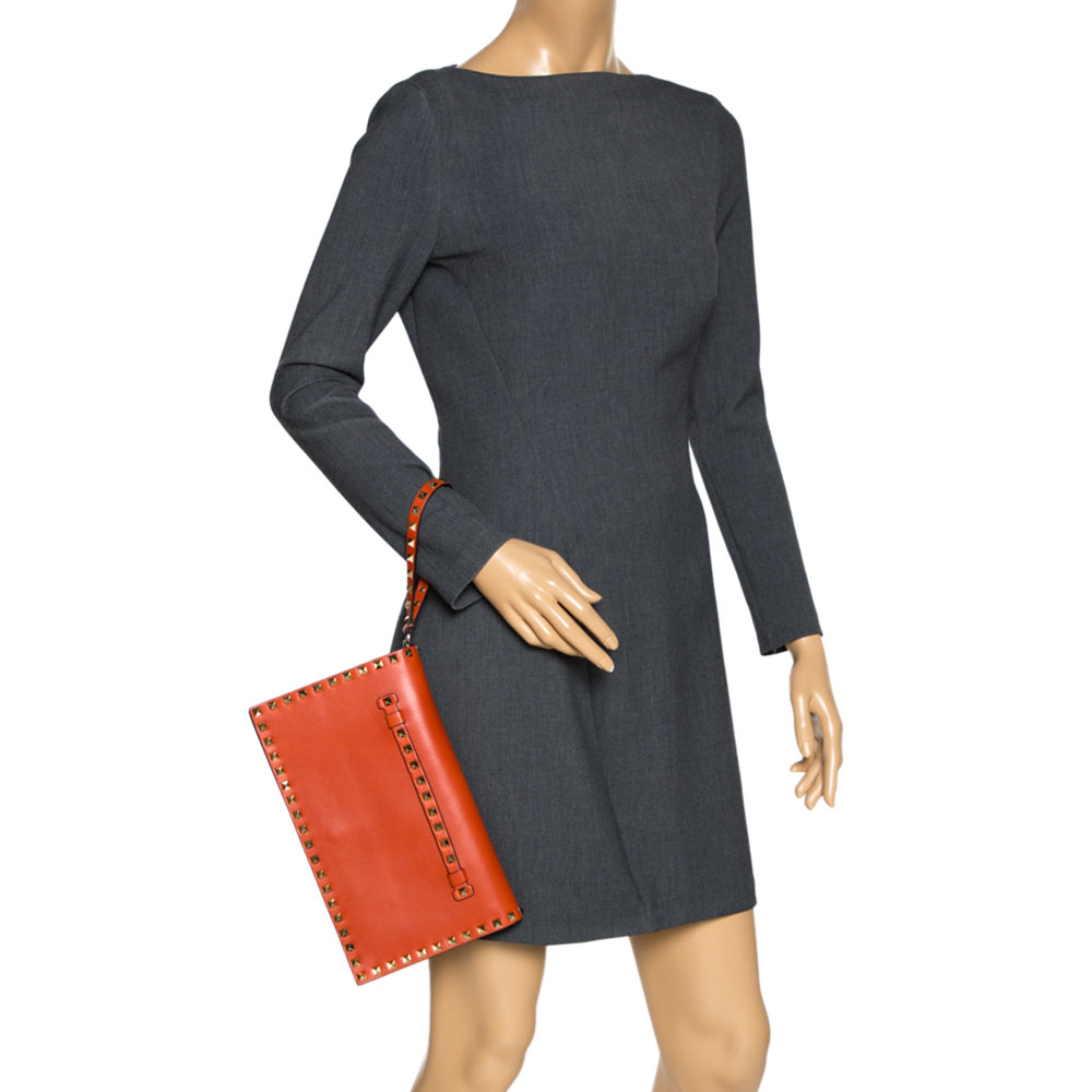 

Valentino Orange Leather Rockstud Wristlet Clutch