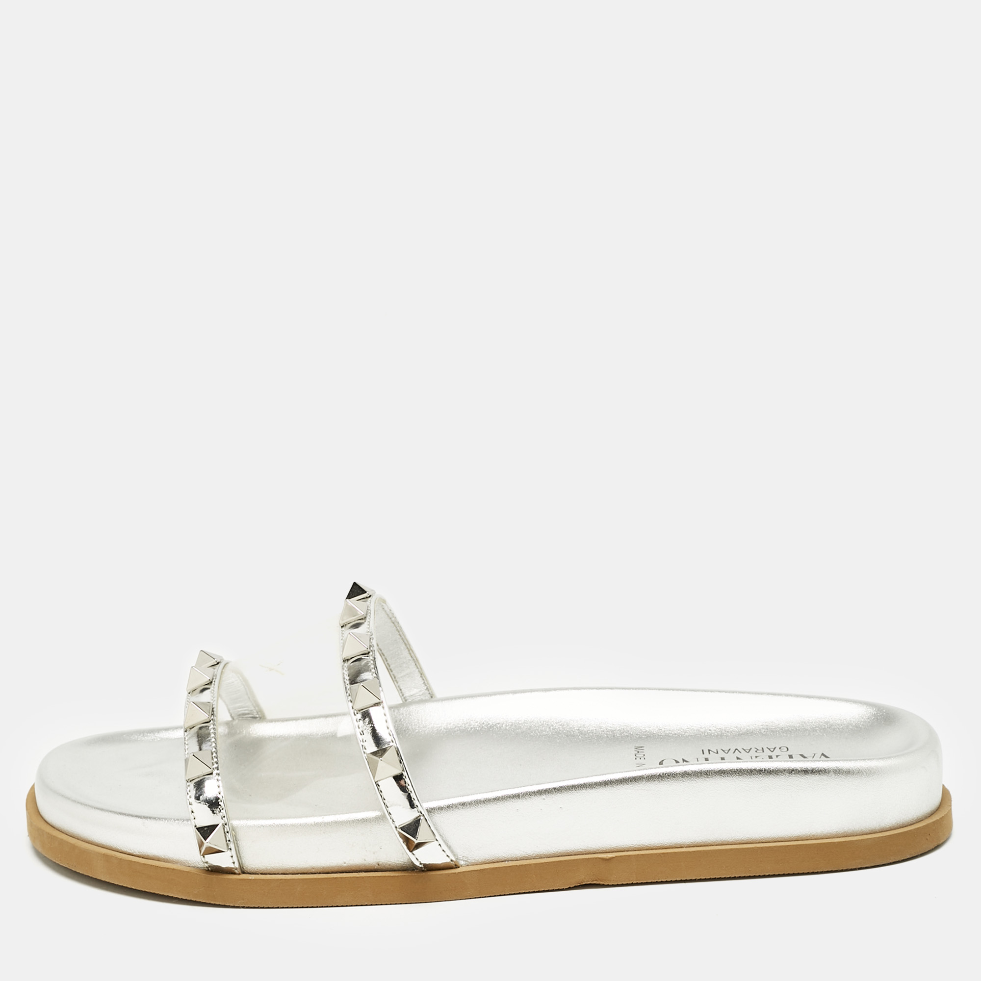 

Valentino Silver Leather And PVC Rockstud Flat Slides Size