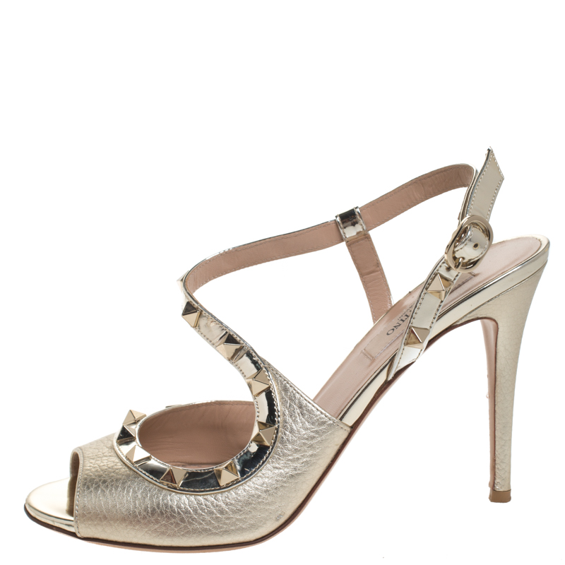 

Valentino Gold Leather Rockstud Cross Strap Sandals Size