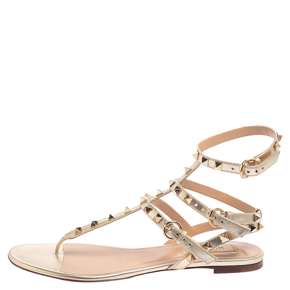 

Valentino Metallic Gold Leather Rockstud Thong Flat Ankle Strap Sandals Size