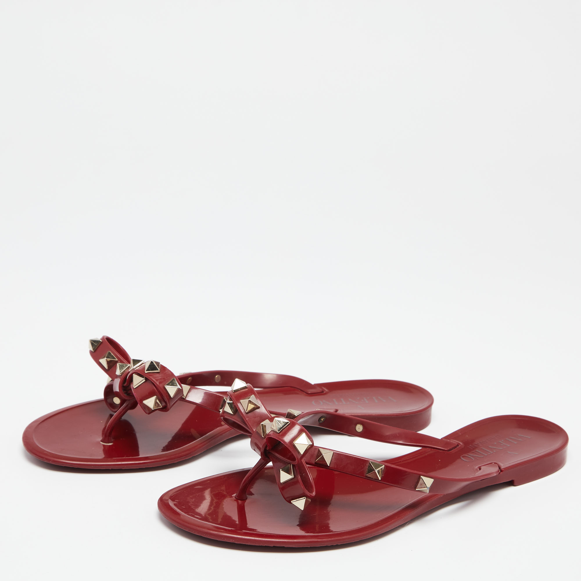 

Valentino Red Jelly Rockstud Bow Thong Flats Size