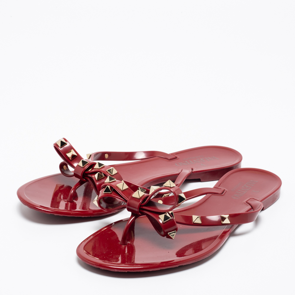 

Valentino Dark Red Jelly Bow Rockstud Thong Flats Size
