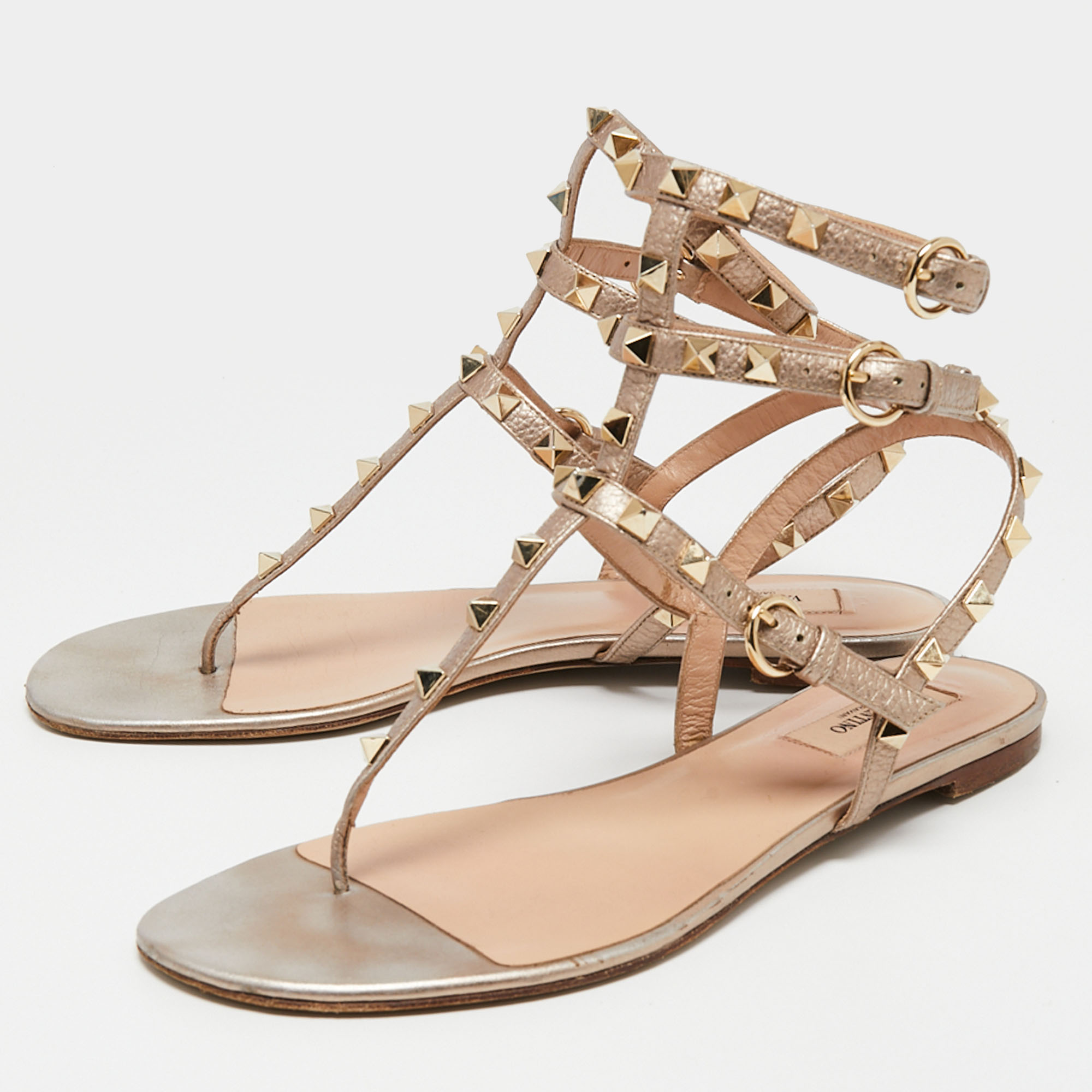 

Valentino Metallic Gold Leather Rockstud Ankle Strap Flat Sandals Size