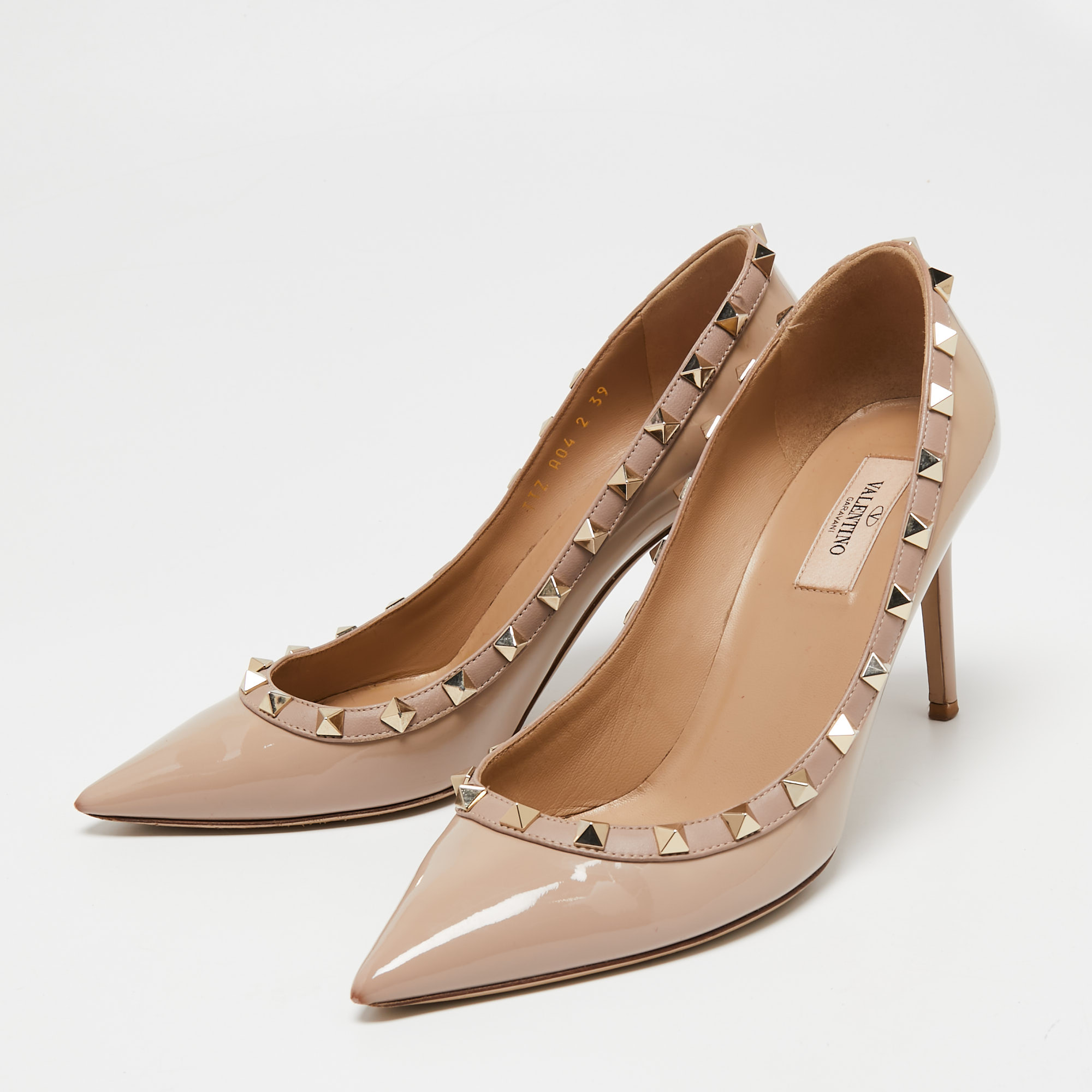 

Valentino Dusty Pink Patent Leather Rockstud Pumps Size