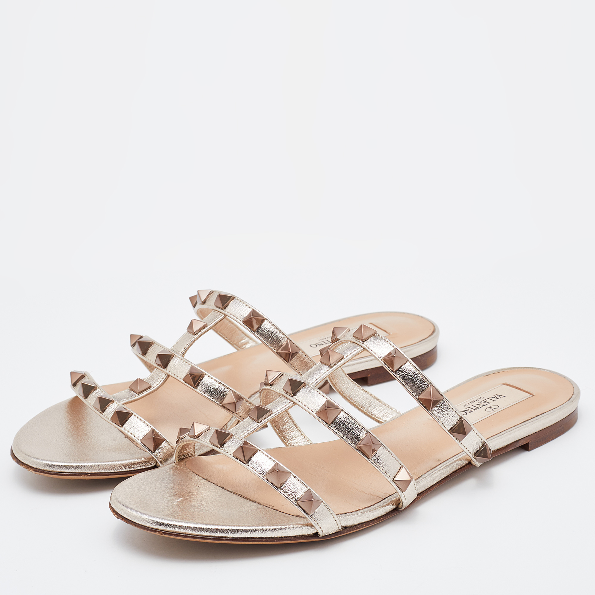 

Valentino Metallic Leather Rockstud Flat Slides Size