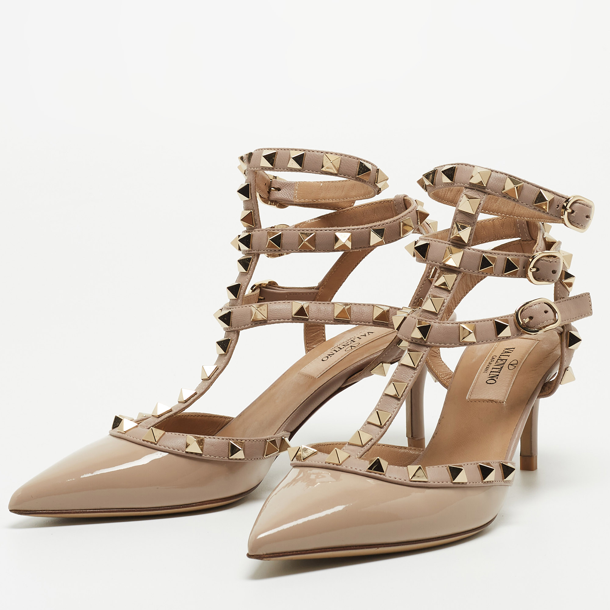 

Valentino Beige Leather and Patent Rockstud Caged Pumps Size