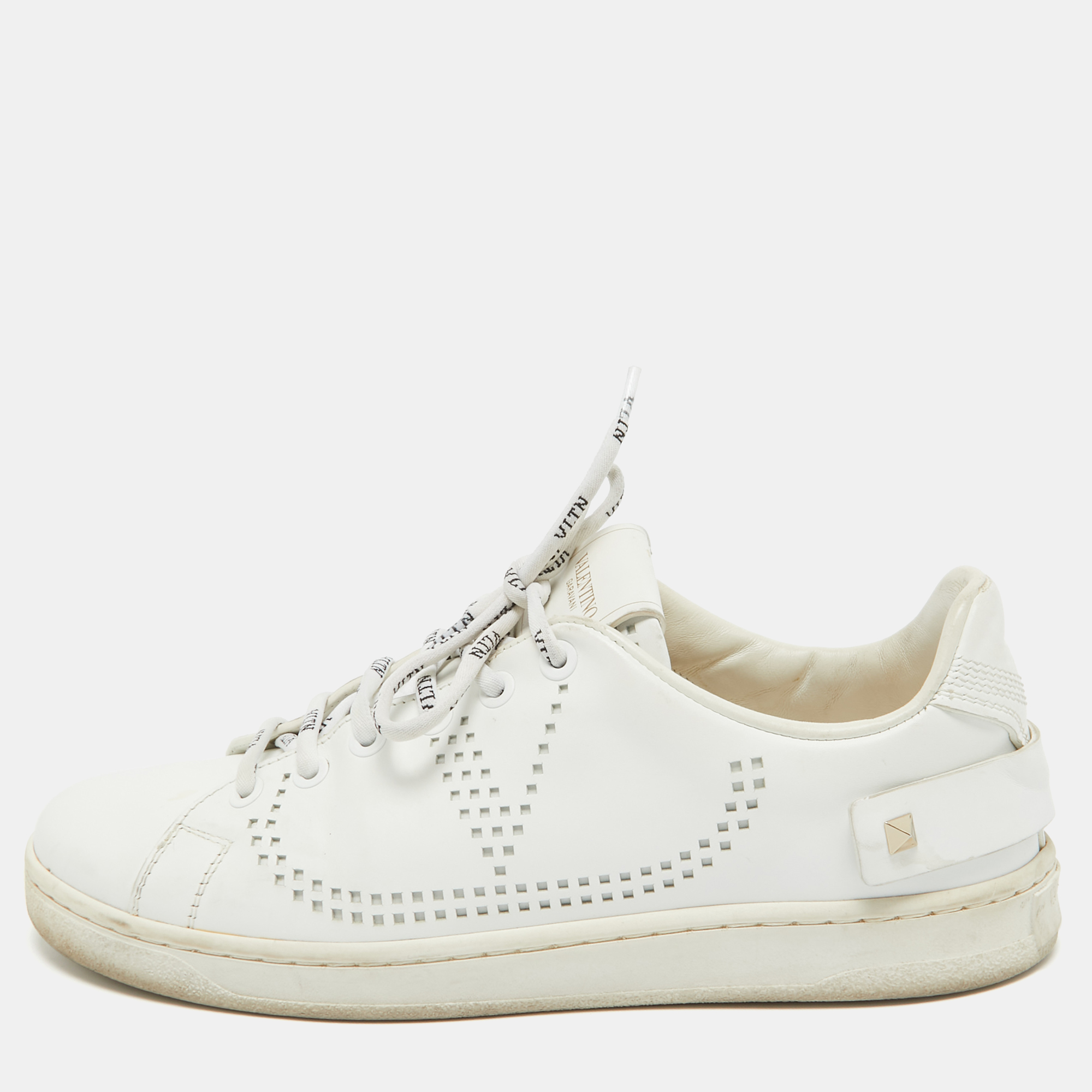 Amp up your off duty wardrobe with Valentinos white Backnet trainers. Theyre crafted in Italy from smooth leather with a Rockstud embellished heel tab and V logo perforations then set on a rubber sole. Style them with neutral separates.