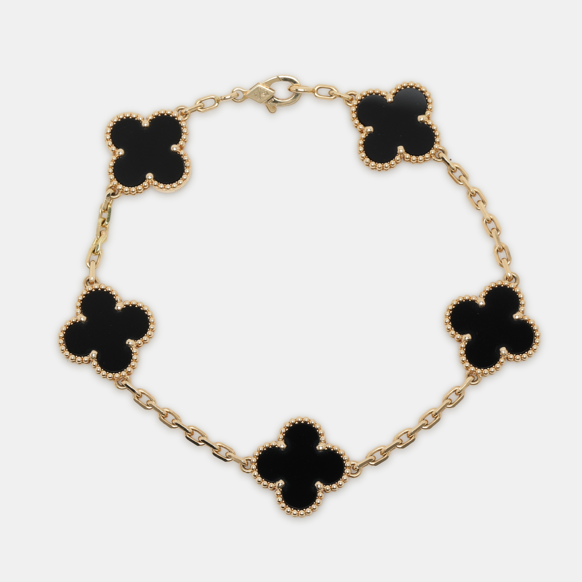 

Van Cleef & Arpels Vintage Alhambra Onyx 18k Yellow Gold 5 Motif Station Bracelet
